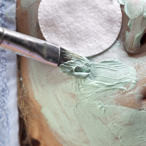woman-applaying-facial-mask-to-girl-2026-01-11-10-03-11-utc